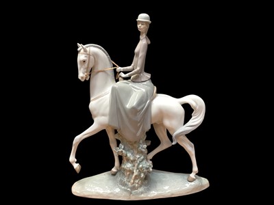 Lot 2254 - Large Lladro porcelain figure of a lady on horseback, 45cm high