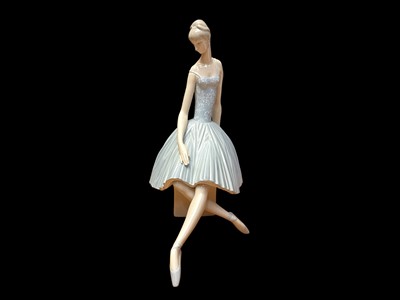Lot 2257 - Lladro porcelain figure of a seated ballerina, 37cm high