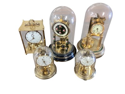 Lot 3157 - Group of five 1950s perpetual motion anniversary clocks, (2 boxes).