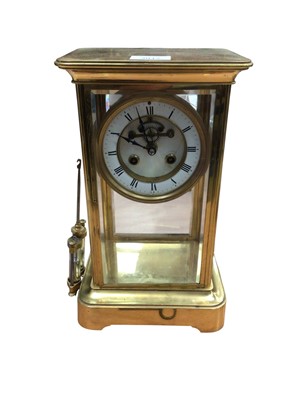 Lot 3012 - Late 19th century four glass clock in brass case with mercury pendulum.