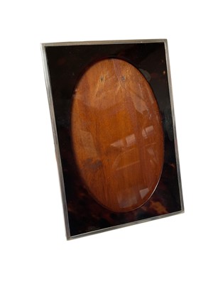 Lot 300 - Silver mounted tortoiseshell photograph frame (Birmingham 1919), 20.5cm x 14cm overall