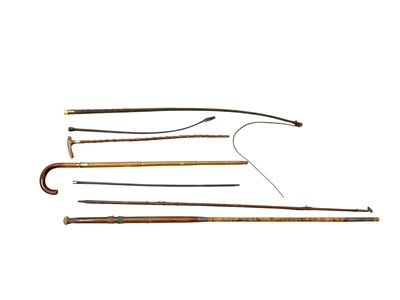 Lot 3138 - Carriage whip, riding crop, silver top can, oval Victorian tin hat box containing top hat, together with antique fishing rod