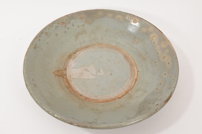 Lot 28 - Antique Chinese celadon saucer dish, believed to be a piece of wreck porcelain.