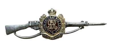 Lot 783 - First World War 9ct gold and silver Royal Engineers sweetheart brooch, depicting a Lee Enfield rifle, the centre with 9ct gold and enamel regimental badge, (Birmingham 1916).