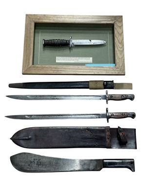 Lot 907 - First World War 1907 pattern Enfield bayonet, with scabbard, together with another without scabbard, a Second World War British Army Machete dated 1940 and an American M3 Trench knife, mounted i...