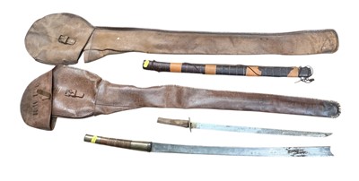 Lot 911 - Early 20th century Burmese Dha, together with a Japanese sword blade and two brown leather sword bags.