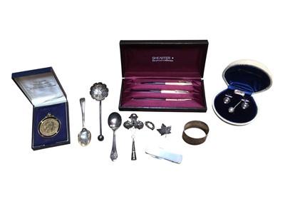 Lot 2970 - Sheaffer pen set comprising two pens and a pencil, silver napkin ring and other miscellaneous silver