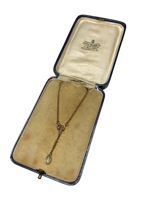 Lot 217 - Edwardian yellow metal aquamarine and seed pearl pendant drop necklace