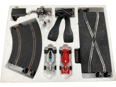 Lot 1983 - Scalextric Grand Prix Shell & Firestone F1 cars, with track, Pacer System and Control Tower, all boxed