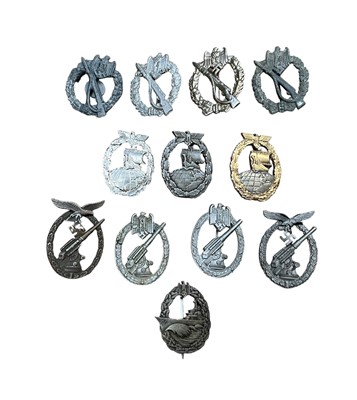 Lot 717 - Collection of twelve Nazi German awards to include Auxiliary Cruisers War badge, Infantry Assault badge and Army Flak badge, (12).