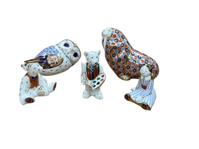 Lot 2315 - Five Royal Crown Derby paperweights - Treasures of Childhood Mini rag doll, Walrus, Mini Bear Artist Claude, Mini Bear Graduate and Owl, all boxed apart from the owl