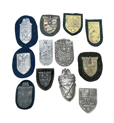 Lot 727 - Collection of twelve Nazi German Shield badges to include Cholm Shield and Kuban Shield, (12).