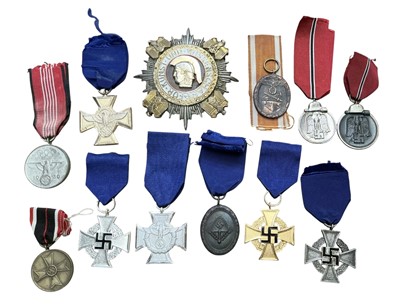 Lot 736 - Group of Nazi German medals and awards to include Faithful Service Decoration, German Defences medal and others.