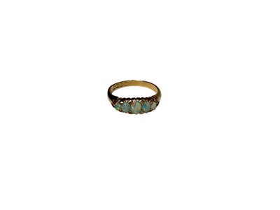 Lot 233 - Edwardian 18ct gold opal five stone ring with five graduated oval opal cabochons and diamond accents in claw setting on 18ct yellowed shank (Chester 1909), size N