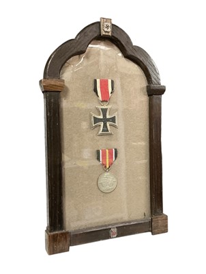 Lot 741 - Second World War Nazi German Iron Cross (Second Class) and another German award, both mounted in a glazed frame.