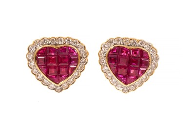 Lot 419 - Pair of ruby and diamond heart shape stud earrings