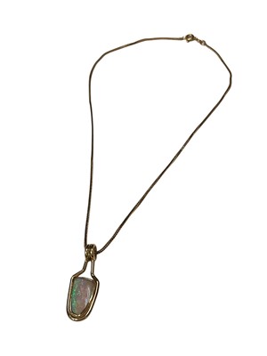Lot 247 - Opal pendant in 14ct gold mount on 14ct gold chain, 40cm long