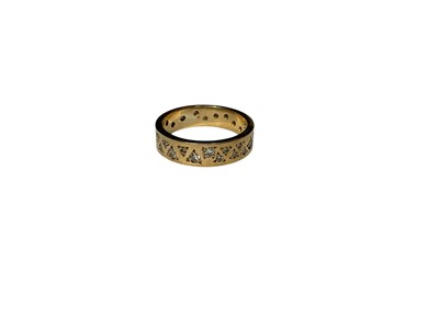Lot 250 - Gold and diamond set eternity style ring, size O