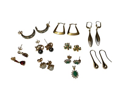 Lot 253 - Nine pairs of gold / yellow metal earrings and 10k pendant