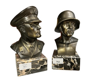 Lot 762 - Pair of bronzed metal busts of Nazi German officers, raised on a marble base, each 23cm in overall height.