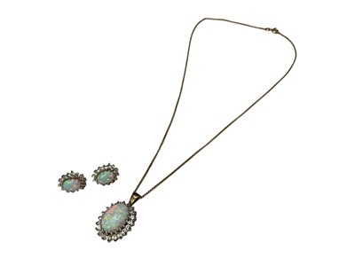 Lot 254 - 9ct gold opal and synthetic white stone cluster pendant on 9ct gold chain and matching pair of 9ct gold earrings