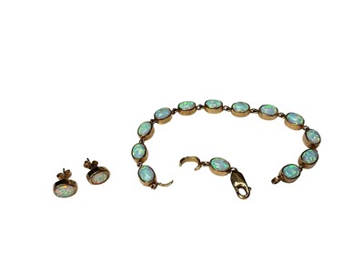 Lot 258 - 9ct gold opal cabochon bracelet (broken) and pair of matching 9ct gold opal cabochon stud earrings