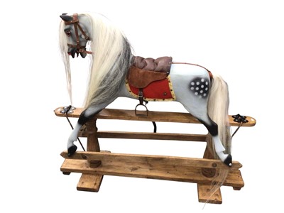 Lot 3013 - Rocking horse on pine base