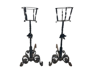 Lot 5319 - Ornate pair of Tuscan wrought iron fire dogs