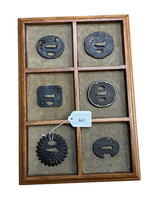 Lot 941 - Collection of six Antique Japanese Tsubas including bronze and iron examples, some with gold inlay , in display box