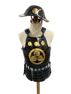 Lot 943 - Antique Japanese composite suit of armour comprising lacquered iron articulated breast and back plates with Mouri family Mon crest decoration and articulated skirts, Samurai Lacquered helmet wit...