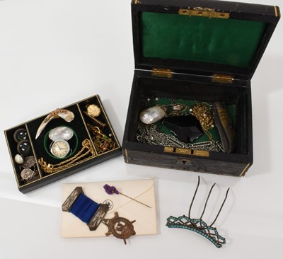 Lot 500 - Victorian leather jewellery box with contents including a mother of pearl snake mounted brooch, a coronation 1911 Stanhope, silver and turquoise hair comb decoration, yellow metal chains and oth...