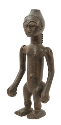 Lot 820 - African tribal carved wood figure of human form, with original green pigment, articulated arms