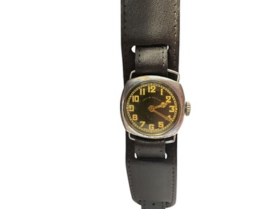 Lot 101 - First World War period trench wristwatch with black enamel 'shock-proof' dial and arabic numerals in a square cushion shaped case