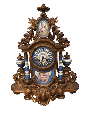 Lot 3041 - Ornate guilt clock (key held)