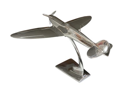 Lot 778 - Contemporary polished metal aircraft model in the form of Supermarine Spitfire, 30cm in length.