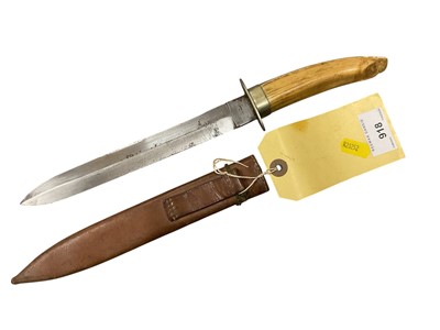 Lot 918 - Late 19th / early 20th century British hunting knife with double edged blade marked 'Markham, Sheffield' with nickel crossguard and Indian wild pig tusk grip in original leather sheath. 34cm
