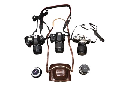 Lot 2988 - Group of cameras and accessories, including an Olympus OM-1N and Sigma lens, Pentax MV1 and lens, Olympus Trip, Nikon F80, etc