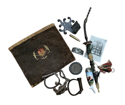 Lot 791 - Pair of antique iron handcuffs by Hiatt, together with a German porcelain pipe and other items.
