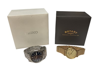 Lot 152 - Seiko stainless steel wristwatch with navy dial and a Rotary gold-plated stainless steel wristwatch with spare leather strap, both boxed