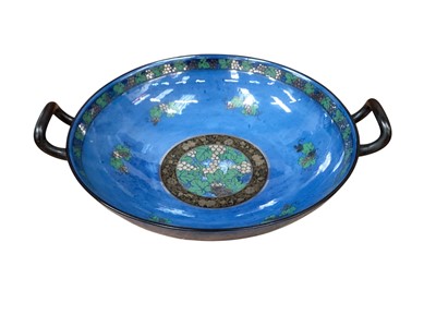 Lot 2338 - Early 20th century Royal Doulton Titanium twin handled shallow bowl decorated with grapes on blue ground, , impressed marks 7619
