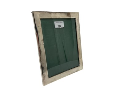 Lot 238 - Early George V silver photograph frame of rectangular form, with wooden easel back (London 1912)