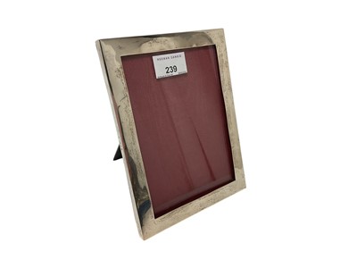 Lot 239 - 1920s silver photograph frame of plain rectangular form, with wooden easel back (London 1921)