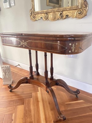 Lot 1525 - Regency rosewood and brass inlaid card table