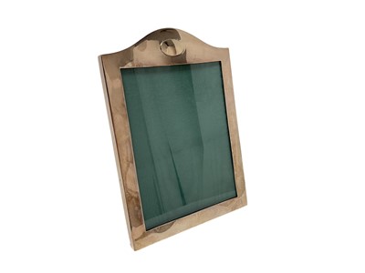 Lot 241 - Early 20th century silver photograph frame of rectangular form, with a domed top, vacant cartouche