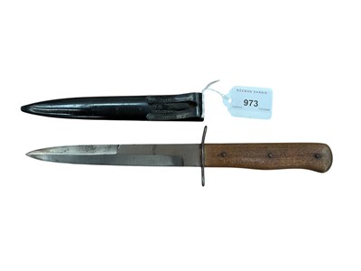 Lot 973 - Nazi Luftwaffe pilots fighting knife with wooden grip in black enamelled steel scabbard with integral sprung clip. 29cm overall