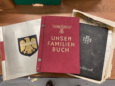 Lot 819 - Group of Nazi German related ephemera to include a cigarette / trading card album 'Die Reichswehr', 'Unser Familien Buch' and a copy of Mein Kampf in a later presentation box, (1 box).