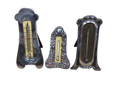 Lot 3043 - Three silver mounted thermometers, the tallest measuring 17.5cm