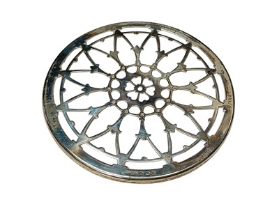 Lot 183 - George V silver and glass teapot stand, (Birmingham 1925), maker Docker & Burn Ltd, 12.9cm in diameter.