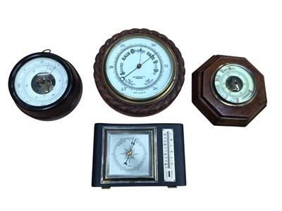 Lot 3057 - Group of four barometers, one a desk barometer with thermometer and three circular wall barometers