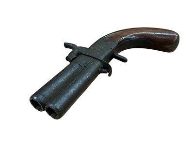Lot 991 - Early Victorian percussion double-barrelled over and under overcoat pistol by Perrin, Worcester, with revolving 80 bore turn-off barrels , engraved box lock with concealed trigger, plain walnut...